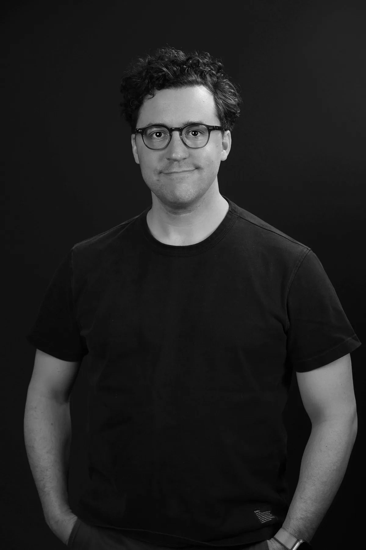Black-and-white portrait of Brad Machado.